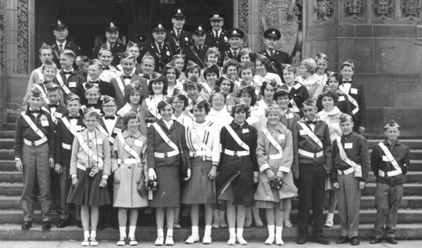 A group of people in uniform posing for a photo.