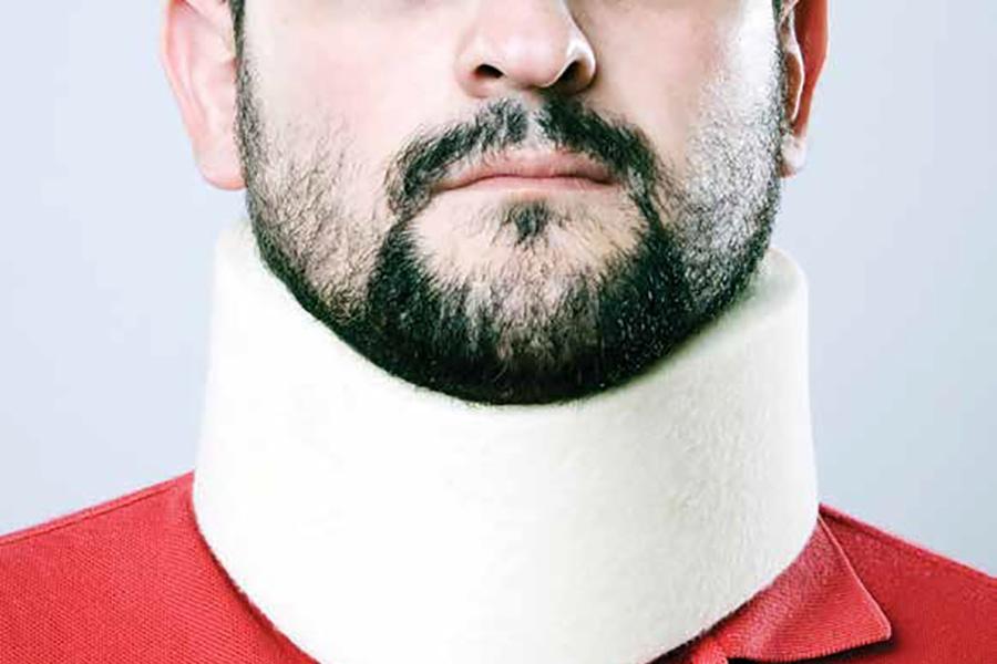 A man with a neck brace.