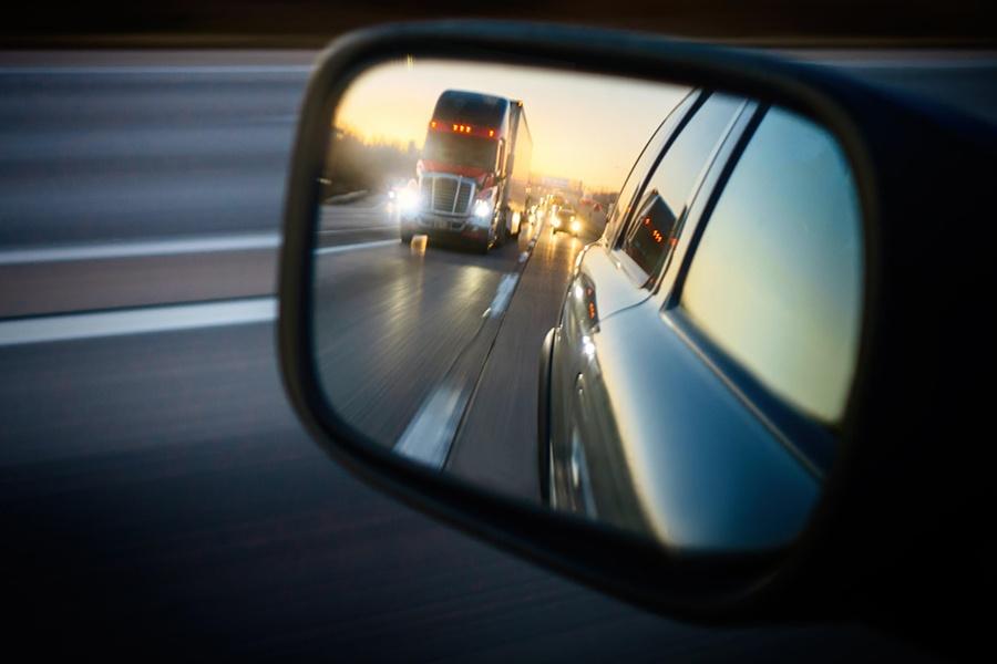 A side view mirror of a car.